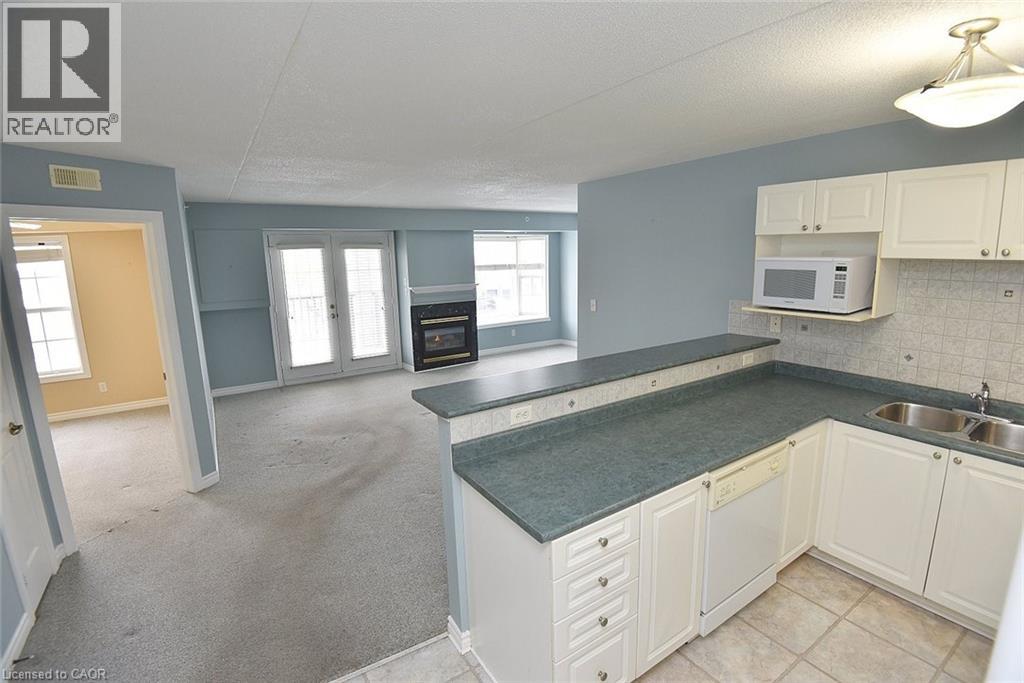 1421 Walkers Line Unit# 203, Burlington, Ontario L7M 4P4 - Photo 19 - 40788113