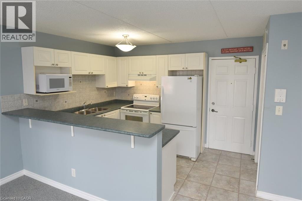 1421 Walkers Line Unit# 203, Burlington, Ontario L7M 4P4 - Photo 21 - 40788113