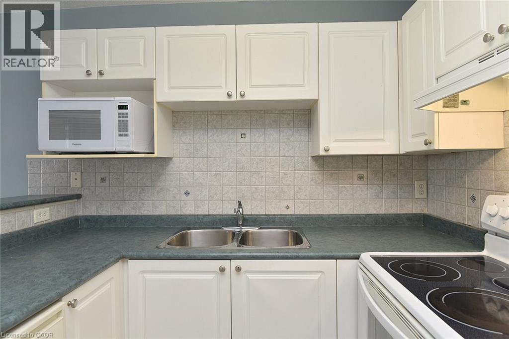 1421 Walkers Line Unit# 203, Burlington, Ontario L7M 4P4 - Photo 17 - 40788113