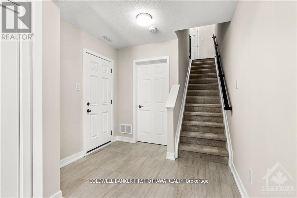 203 Anyolite Private, Ottawa, Ontario  K2J 7J3 - Photo 5 - X12542042