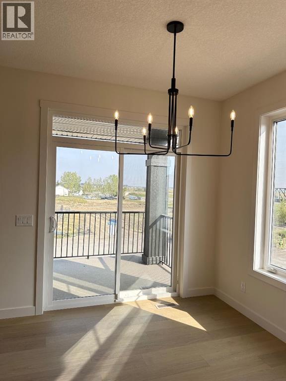 13 Waterford Glen, Chestermere, Alberta  T1X 2T8 - Photo 7 - A2216188