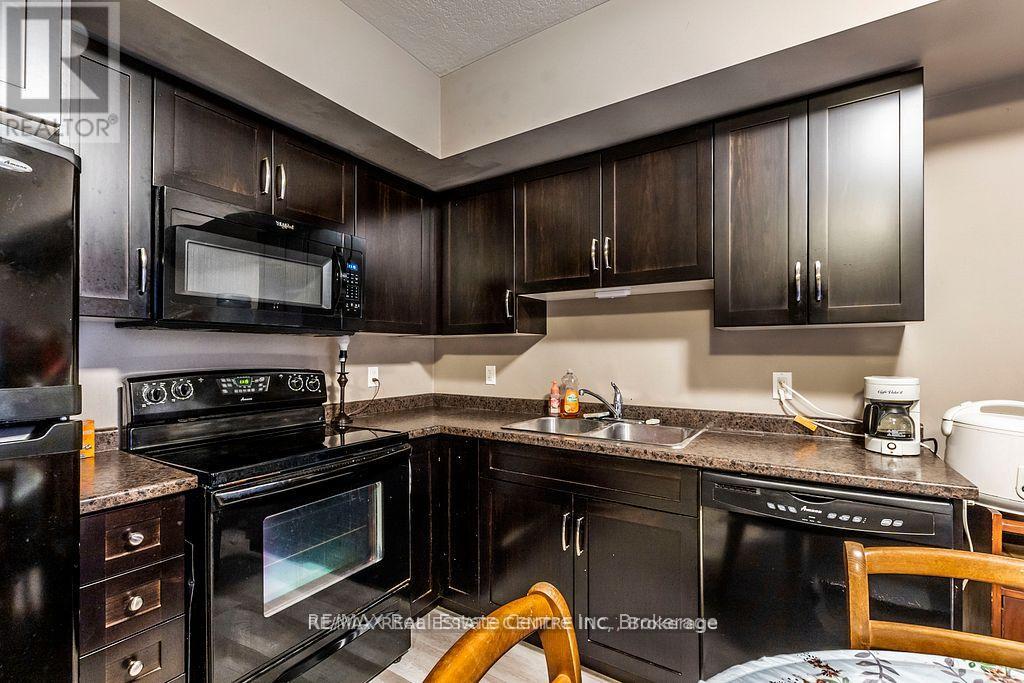 8b - 38 Howe Drive, Kitchener, Ontario  N2E 0E3 - Photo 10 - X12541892