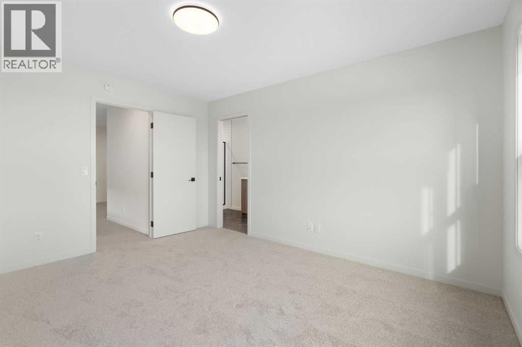 49 Annette Landing Nw, Calgary, Alberta  T3R 2J7 - Photo 30 - A2270399