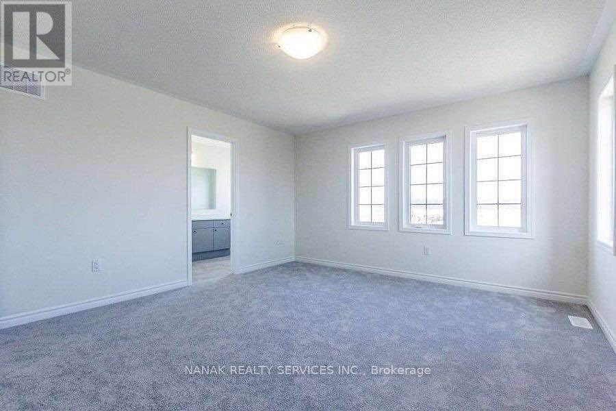 583 Queen Mary Drive, Brampton, Ontario L7A 5H3 - Photo 6 - W12542030