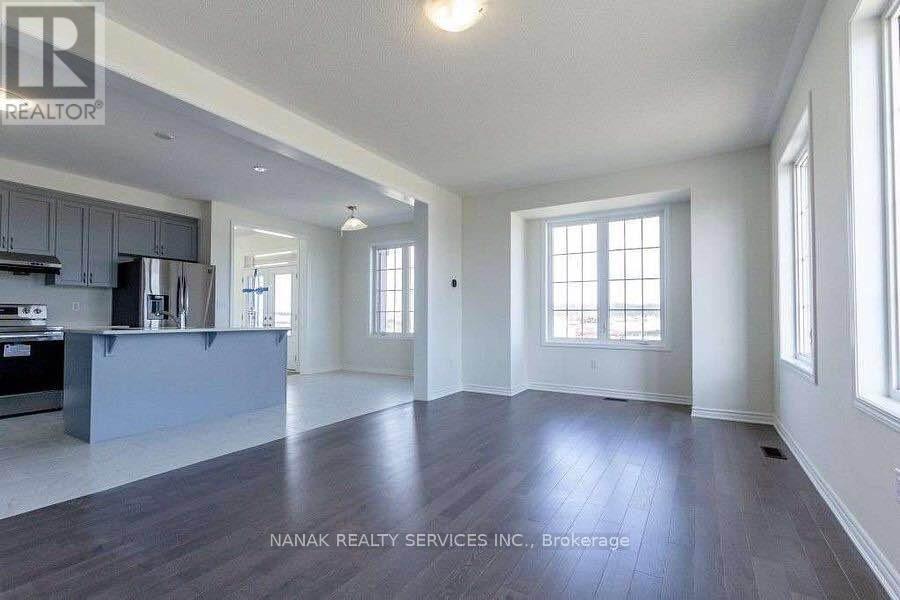 583 Queen Mary Drive, Brampton, Ontario L7A 5H3 - Photo 8 - W12542030