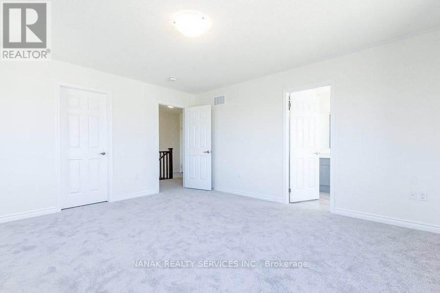 583 Queen Mary Drive, Brampton, Ontario L7A 5H3 - Photo 9 - W12542030