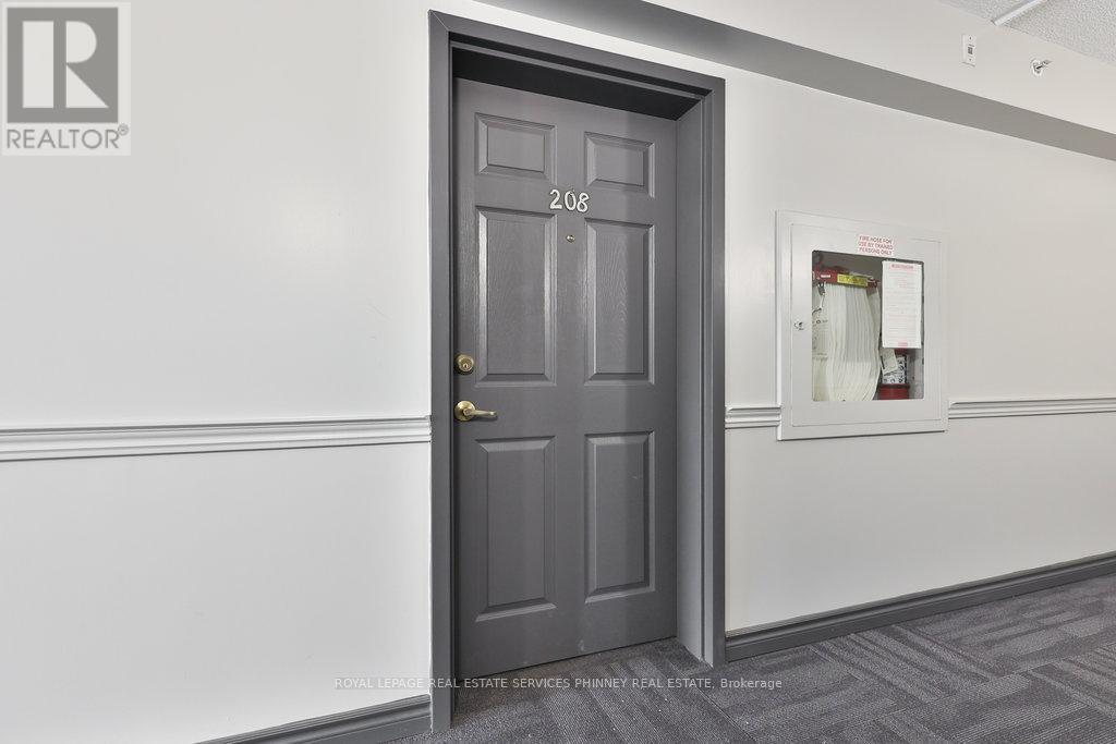 208 - 1441 Walker's Line, Burlington, Ontario  L7M 4P2 - Photo 2 - W12542272