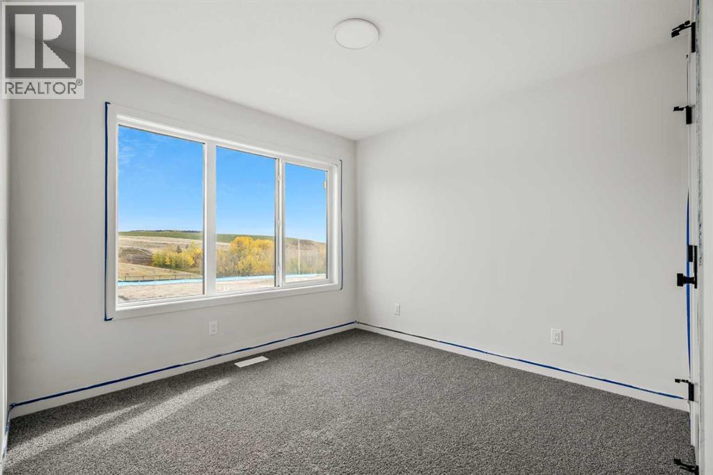 50 Heritage Heath, Cochrane, Alberta  T0T 0T0 - Photo 35 - A2262939