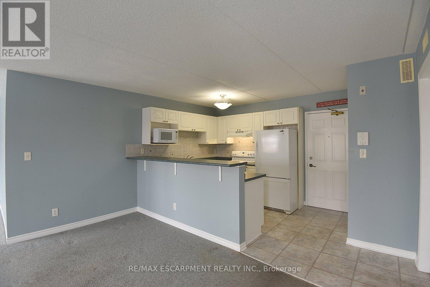 203 - 1421 Walkers Line, Burlington, Ontario  L7M 4P4 - Photo 15 - W12542370