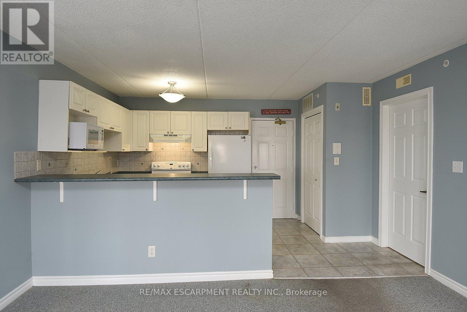 203 - 1421 Walkers Line, Burlington, Ontario  L7M 4P4 - Photo 18 - W12542370