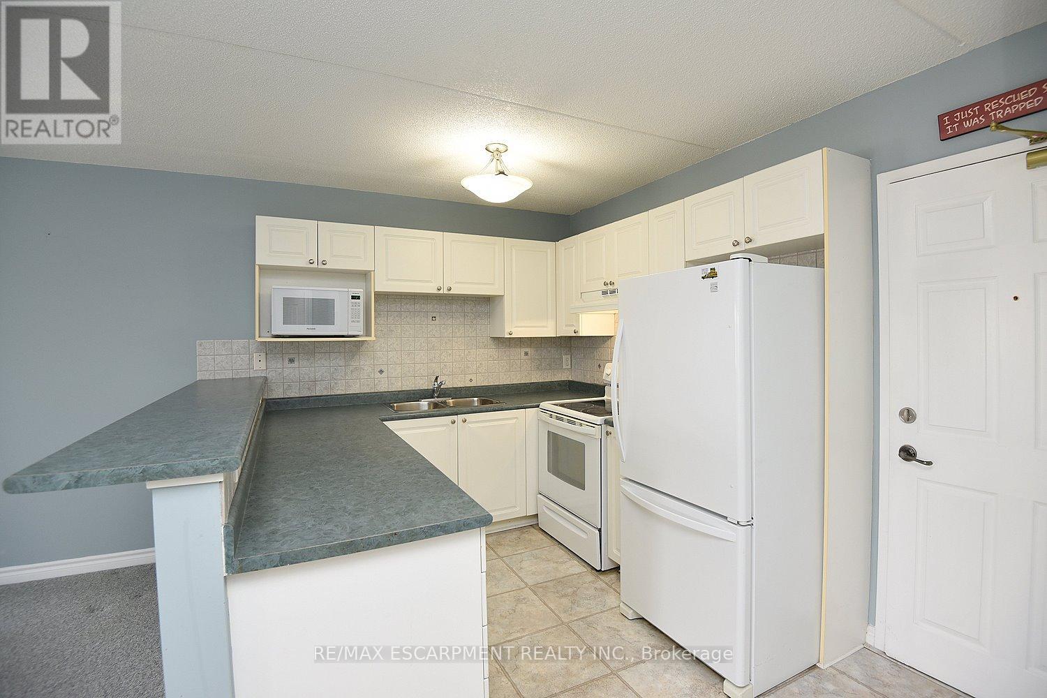 203 - 1421 Walkers Line, Burlington, Ontario  L7M 4P4 - Photo 20 - W12542370