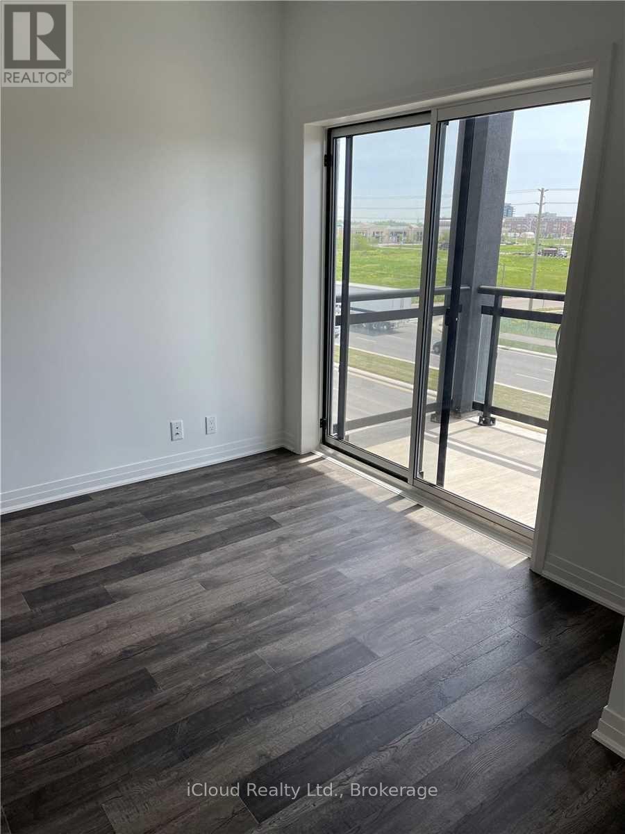 320 - 102 Grovewood Common Drive, Oakville, Ontario  L6H 0X2 - Photo 2 - W12542414