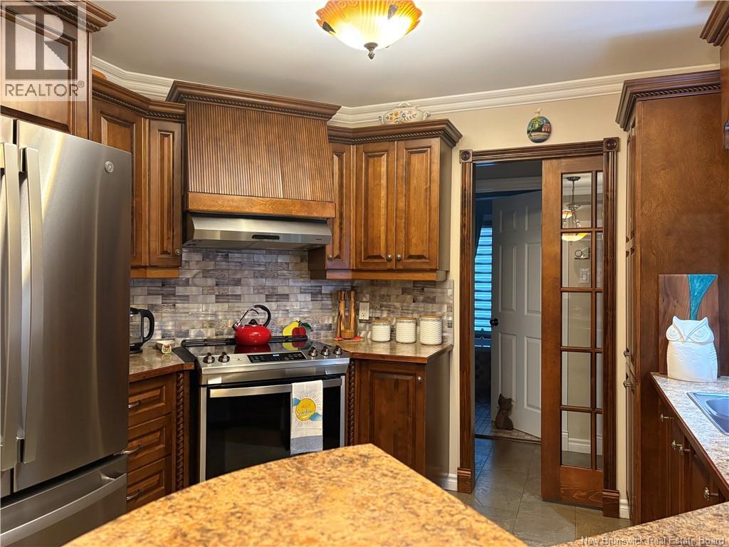 244 Marie Street, Beresford, New Brunswick  E8K 1P8 - Photo 20 - NB129912