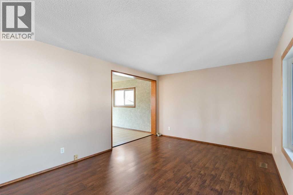 125 Big Springs Drive, Airdrie, Alberta  T4A 1K9 - Photo 5 - A2247354