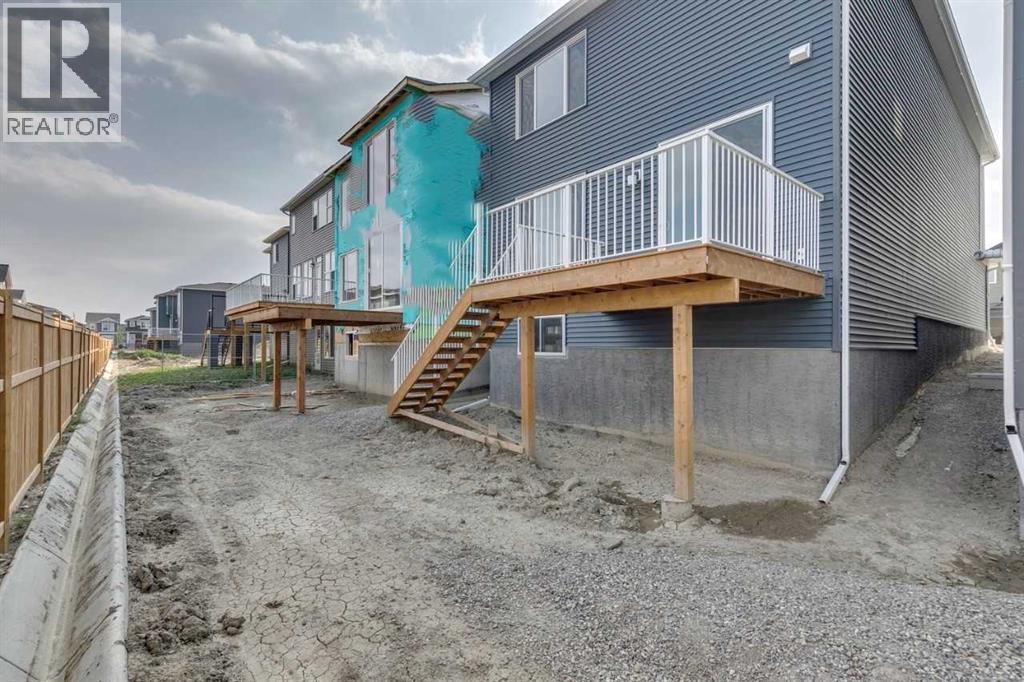 104 Amblefield Grove Nw, Calgary, Alberta  T3P 2L4 - Photo 4 - A2254589