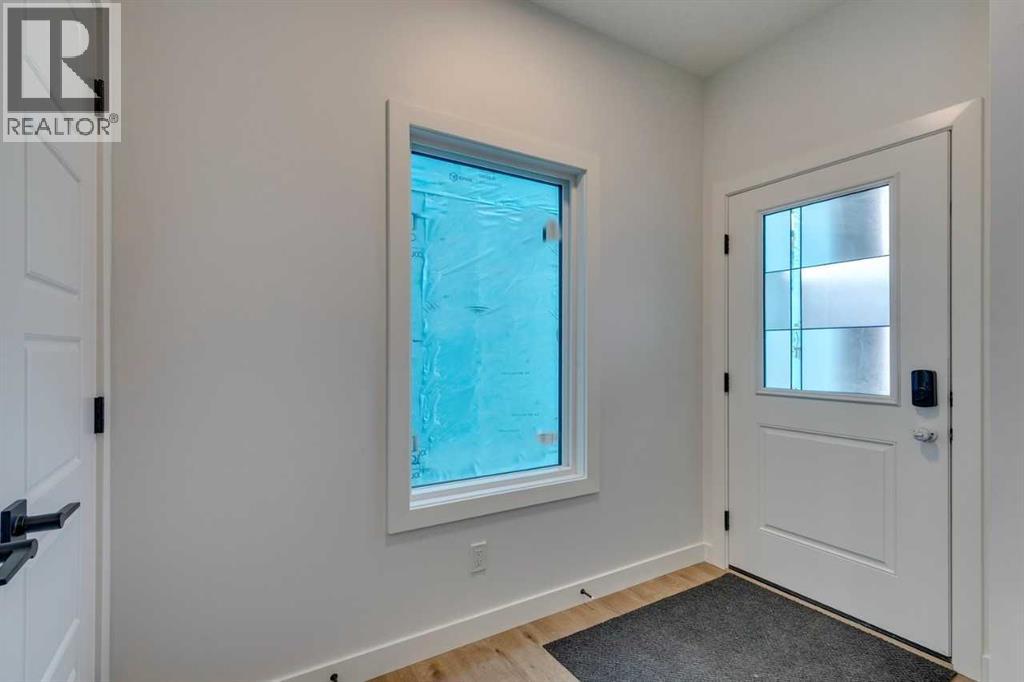 104 Amblefield Grove Nw, Calgary, Alberta  T3P 2L4 - Photo 7 - A2254589