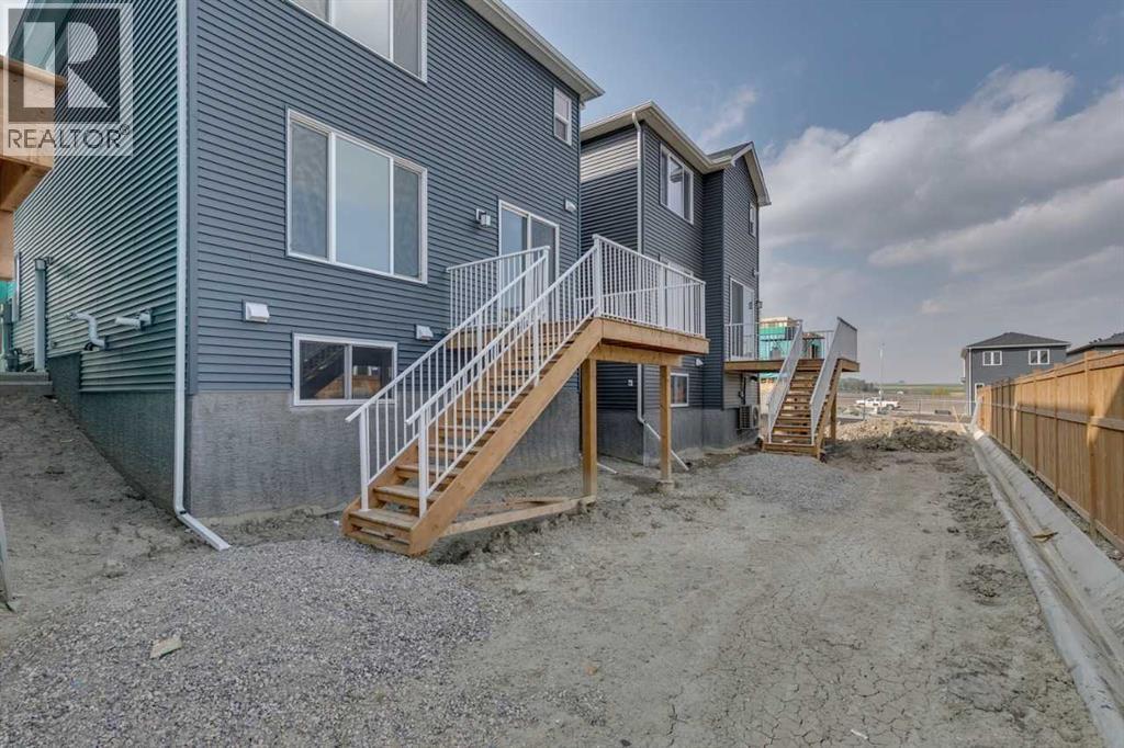 104 Amblefield Grove Nw, Calgary, Alberta  T3P 2L4 - Photo 5 - A2254589