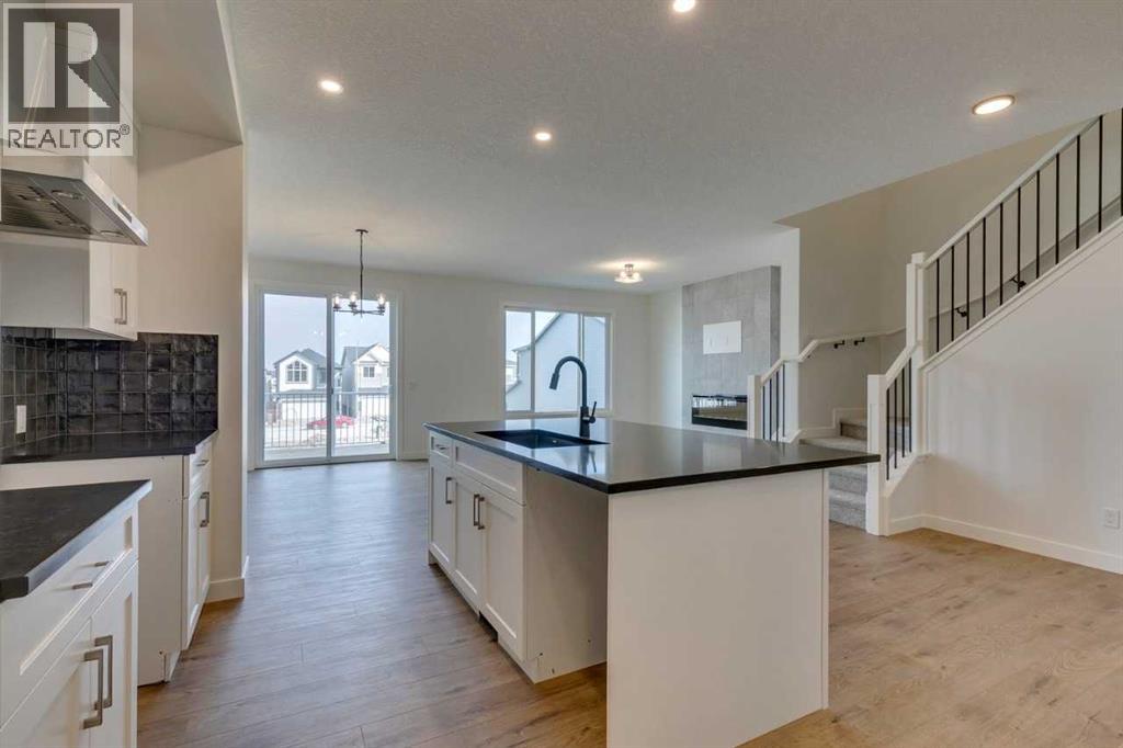 104 Amblefield Grove Nw, Calgary, Alberta  T3P 2L4 - Photo 9 - A2254589