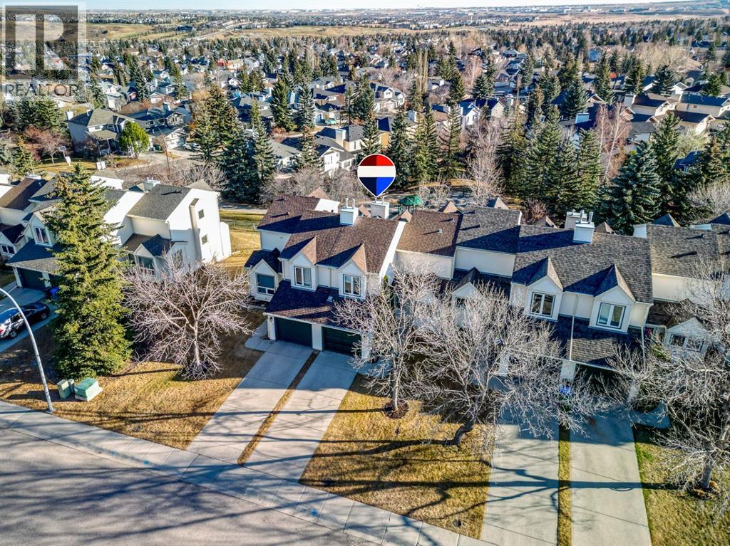 221 Sandringham Road Nw, Calgary, Alberta  T3K 3Z1 - Photo 1 - A2269021