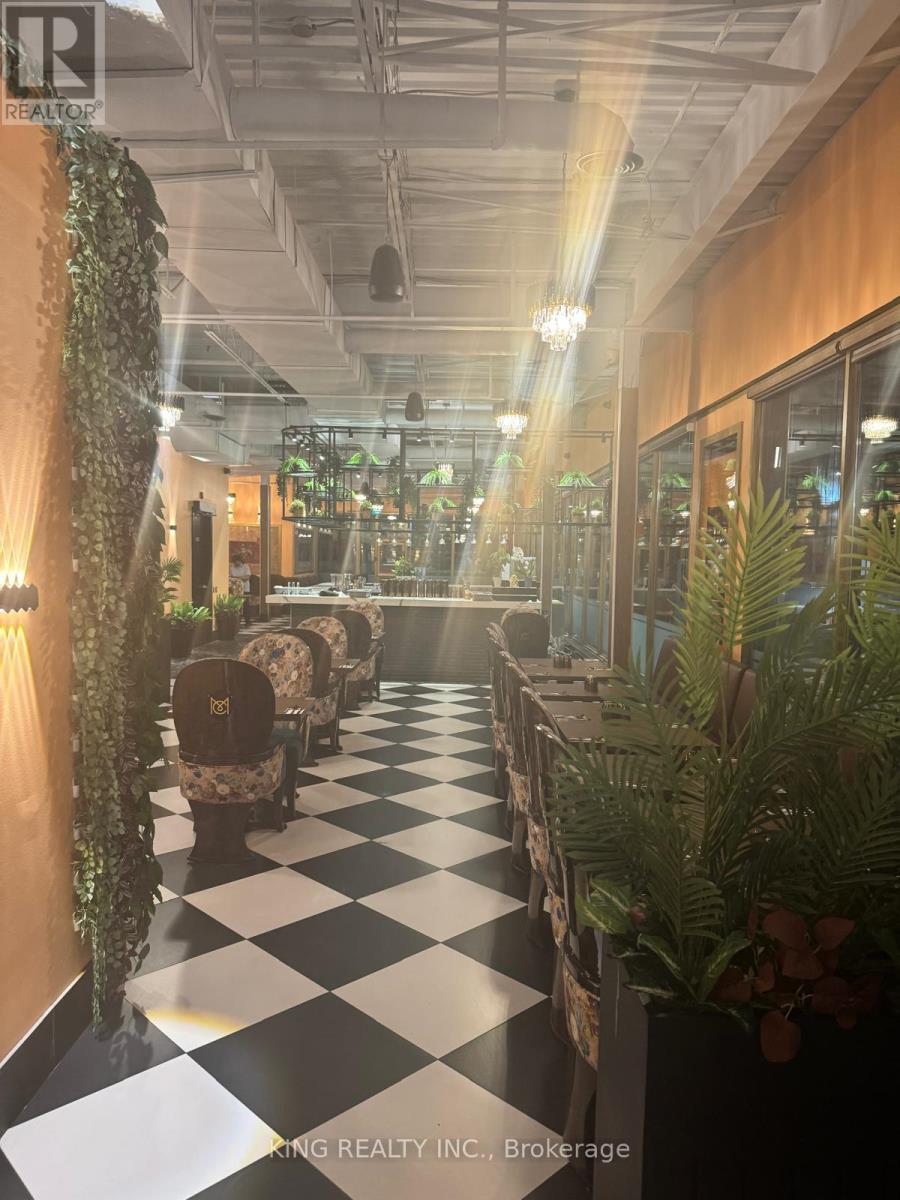 R170 - 2 County Crt Boulevard, Brampton, Ontario  L6W 3W8 - Photo 6 - W12542600