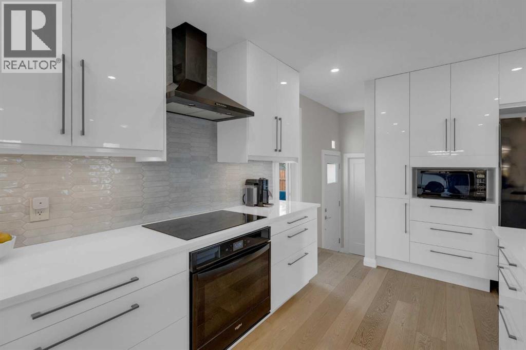 24 Canyon Drive Nw, Calgary, Alberta  T2L 0R3 - Photo 11 - A2253401