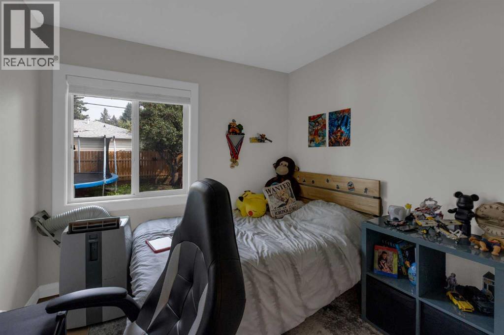 24 Canyon Drive Nw, Calgary, Alberta  T2L 0R3 - Photo 14 - A2253401