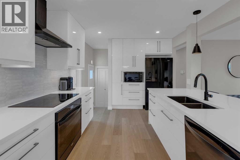 24 Canyon Drive Nw, Calgary, Alberta  T2L 0R3 - Photo 10 - A2253401