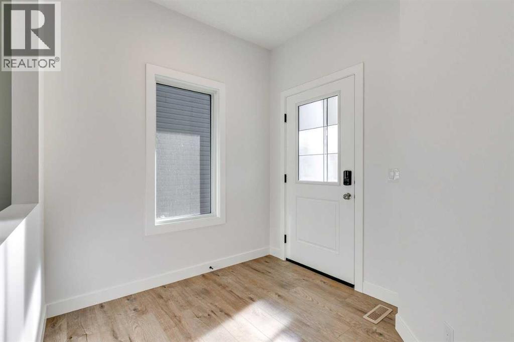 152 Hotchkiss Common Se, Calgary, Alberta  T3S 0J5 - Photo 4 - A2250197