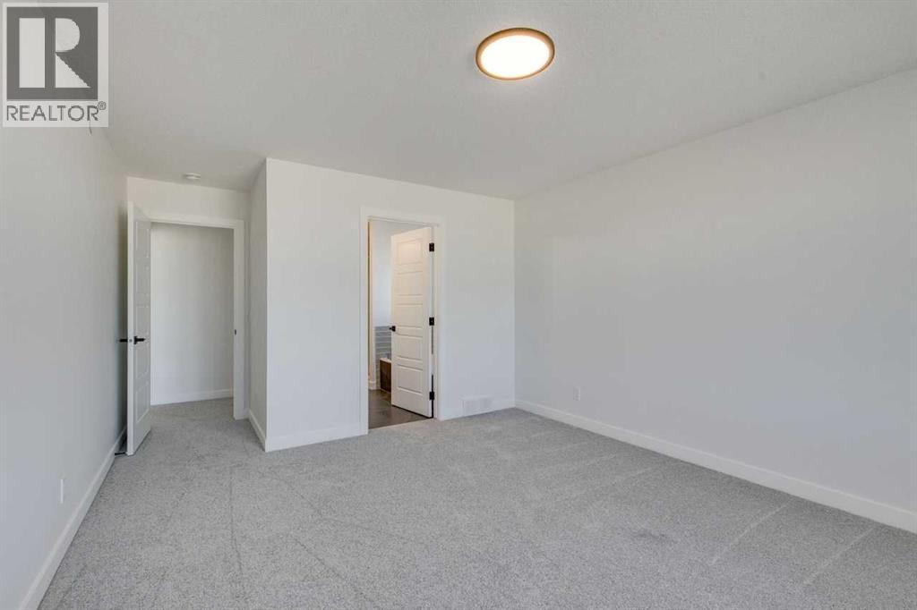 152 Hotchkiss Common Se, Calgary, Alberta  T3S 0J5 - Photo 26 - A2250197