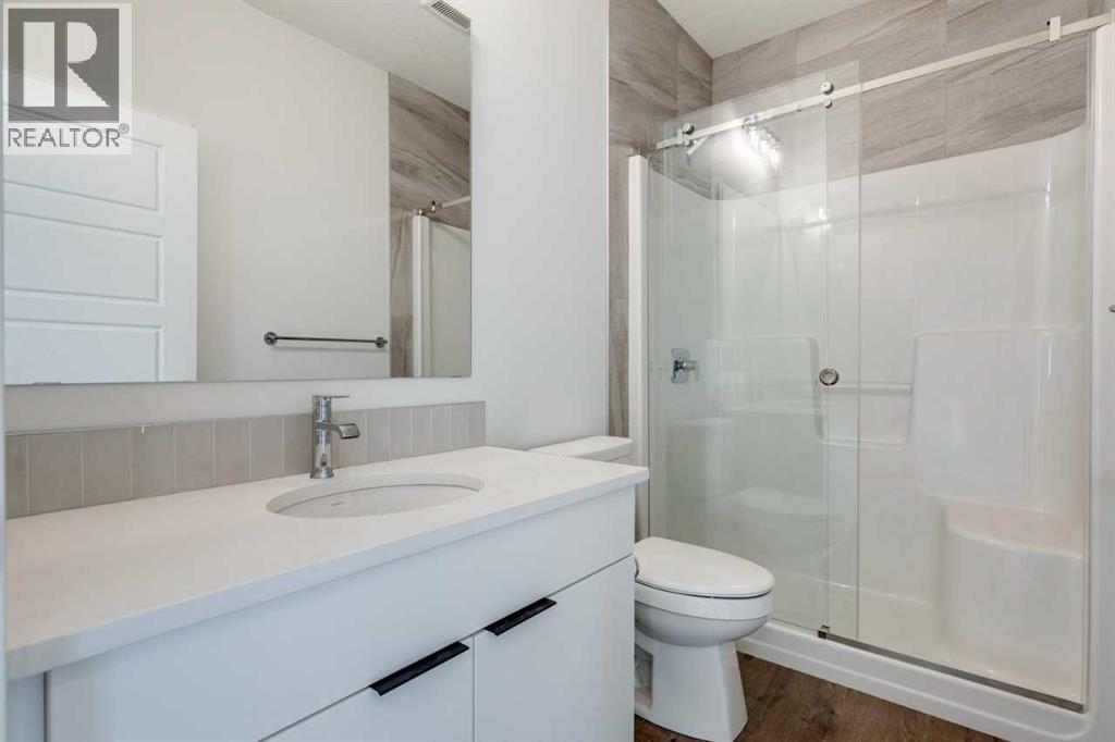 54 Amblefield Common Nw, Calgary, Alberta  T3P 2L5 - Photo 4 - A2249603