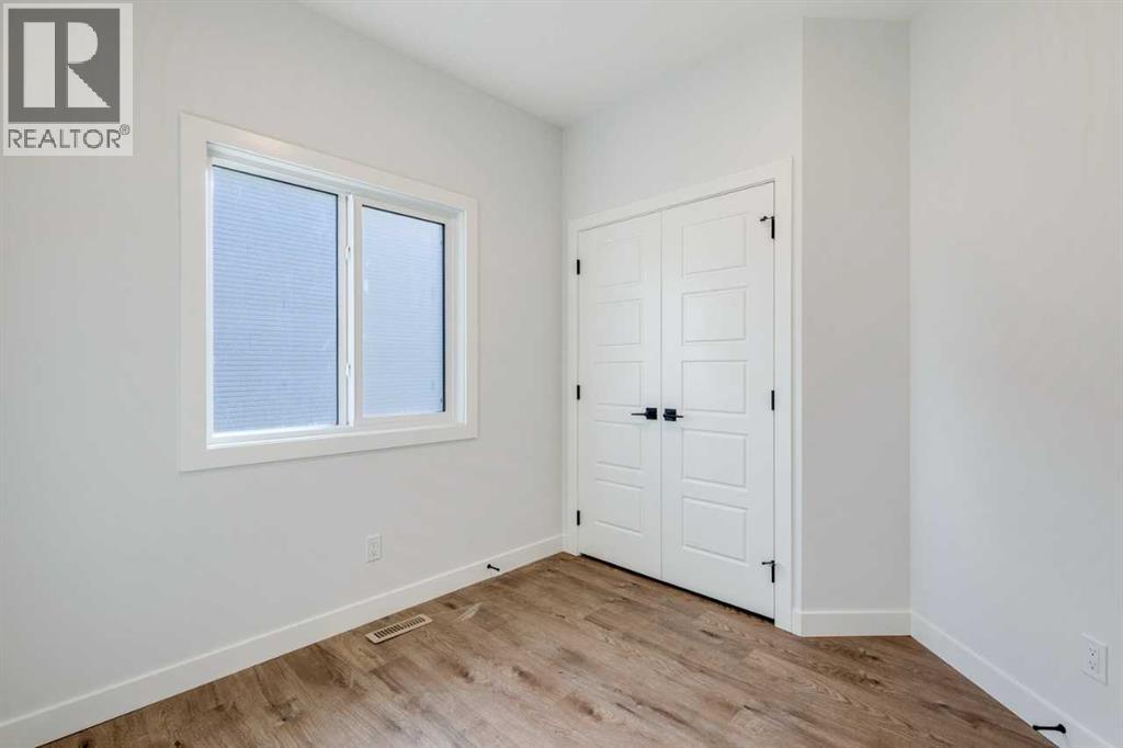 54 Amblefield Common Nw, Calgary, Alberta  T3P 2L5 - Photo 5 - A2249603