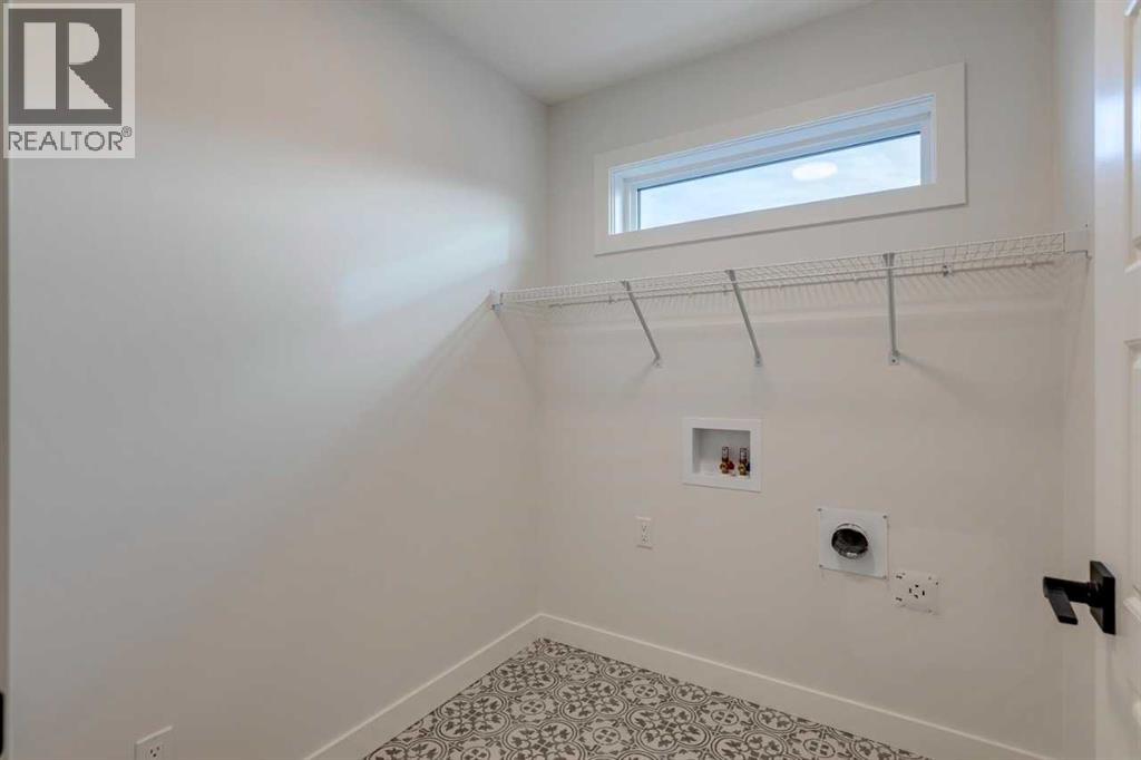 54 Amblefield Common Nw, Calgary, Alberta  T3P 2L5 - Photo 30 - A2249603