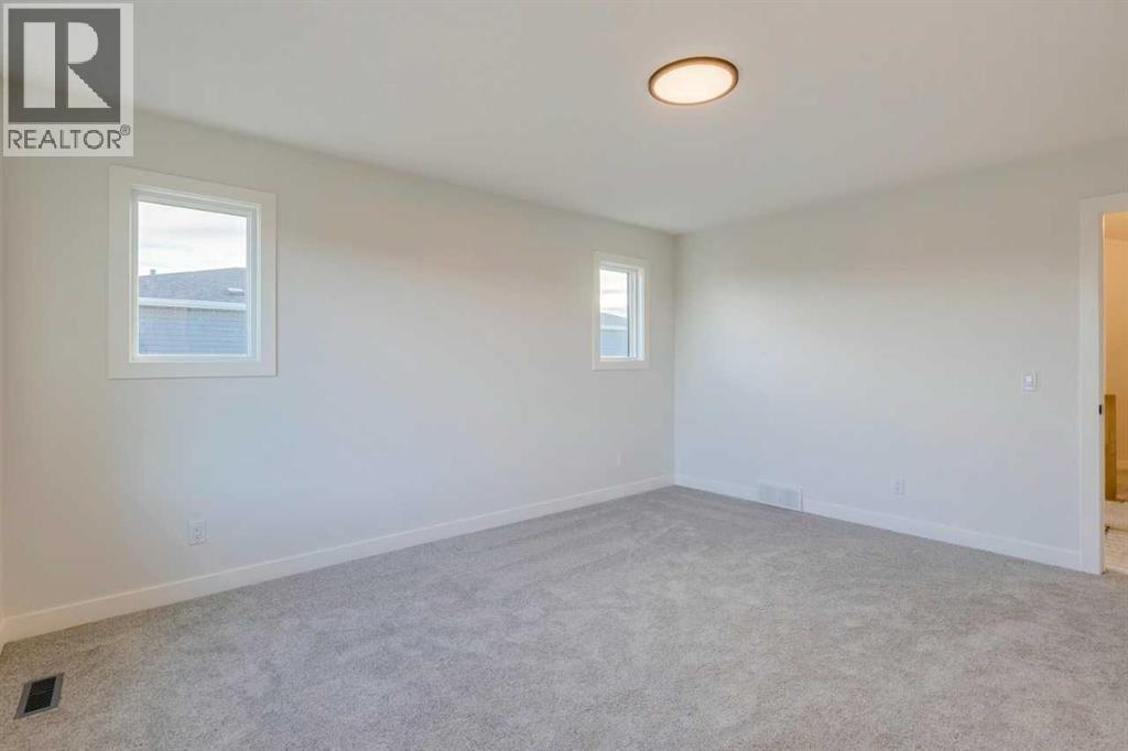 54 Amblefield Common Nw, Calgary, Alberta  T3P 2L5 - Photo 38 - A2249603