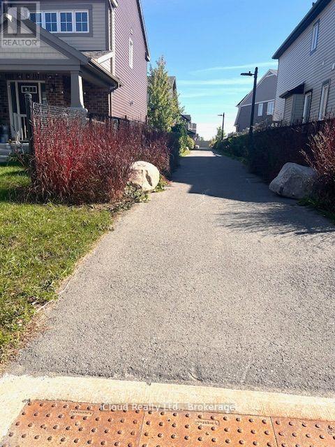 521 Honeylocust Avenue, Ottawa, Ontario  K2V 0K9 - Photo 4 - X12542858