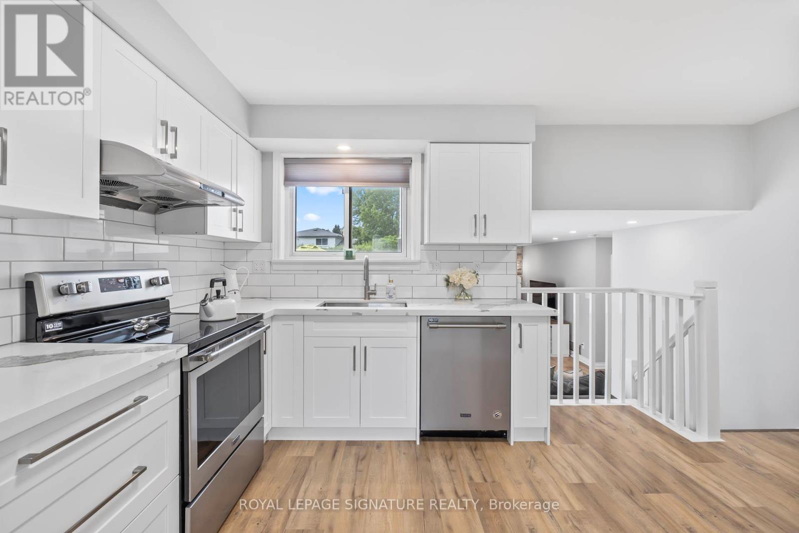 9 Faludon Drive, Halton Hills, Ontario  L7G 1H6 - Photo 6 - W12542888