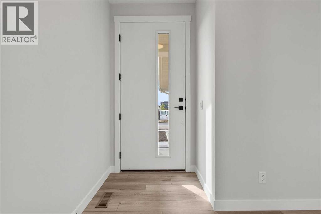 315 Kinniburgh Loop, Chestermere, Alberta  T1X 3C3 - Photo 4 - A2235121