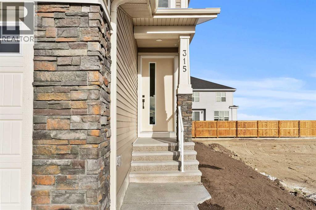 315 Kinniburgh Loop, Chestermere, Alberta  T1X 3C3 - Photo 2 - A2235121