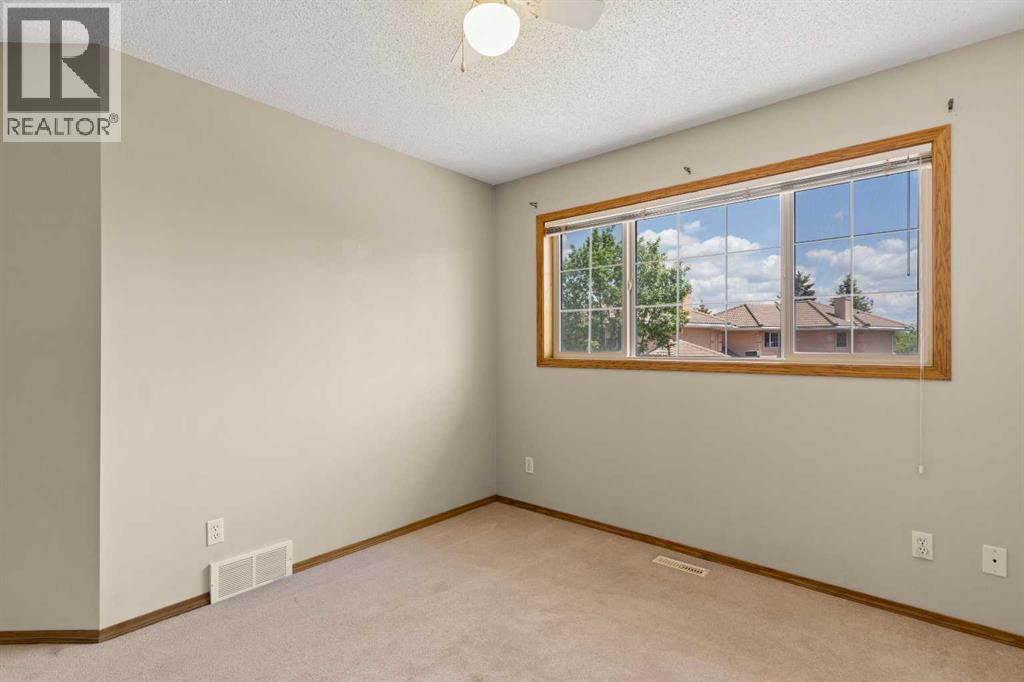 202 Coral Cove Ne, Calgary, Alberta  T3J 3Y9 - Photo 17 - A2269851