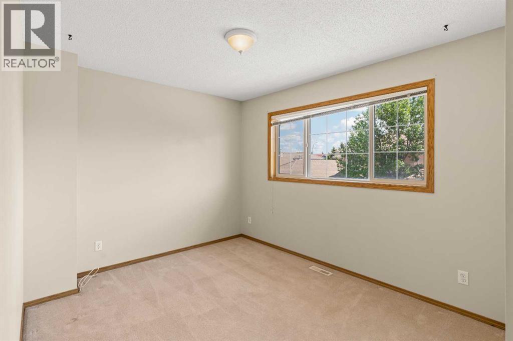 202 Coral Cove Ne, Calgary, Alberta  T3J 3Y9 - Photo 12 - A2269851