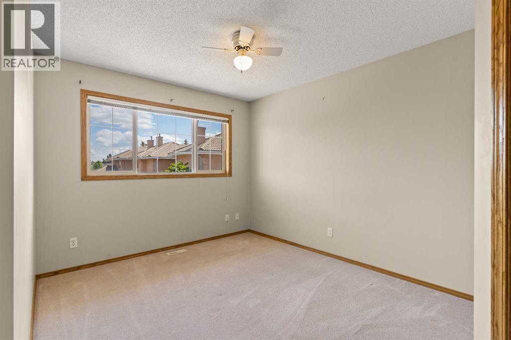 202 Coral Cove Ne, Calgary, Alberta  T3J 3Y9 - Photo 16 - A2269851