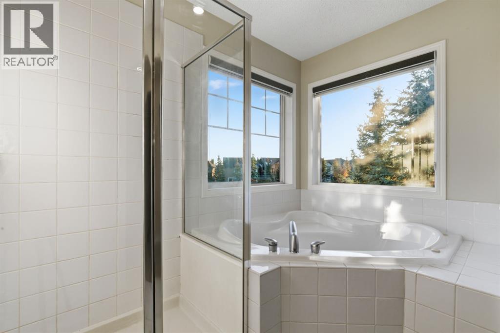 64 Cougarstone Square Sw, Calgary, Alberta  T3H 5J4 - Photo 30 - A2262348