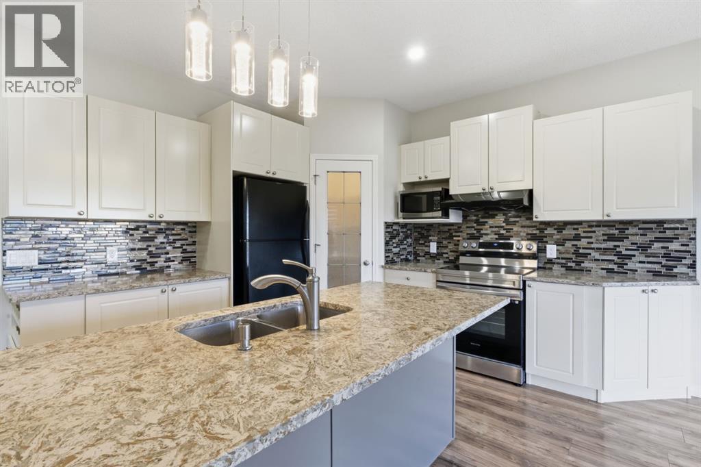 64 Cougarstone Square Sw, Calgary, Alberta  T3H 5J4 - Photo 9 - A2262348