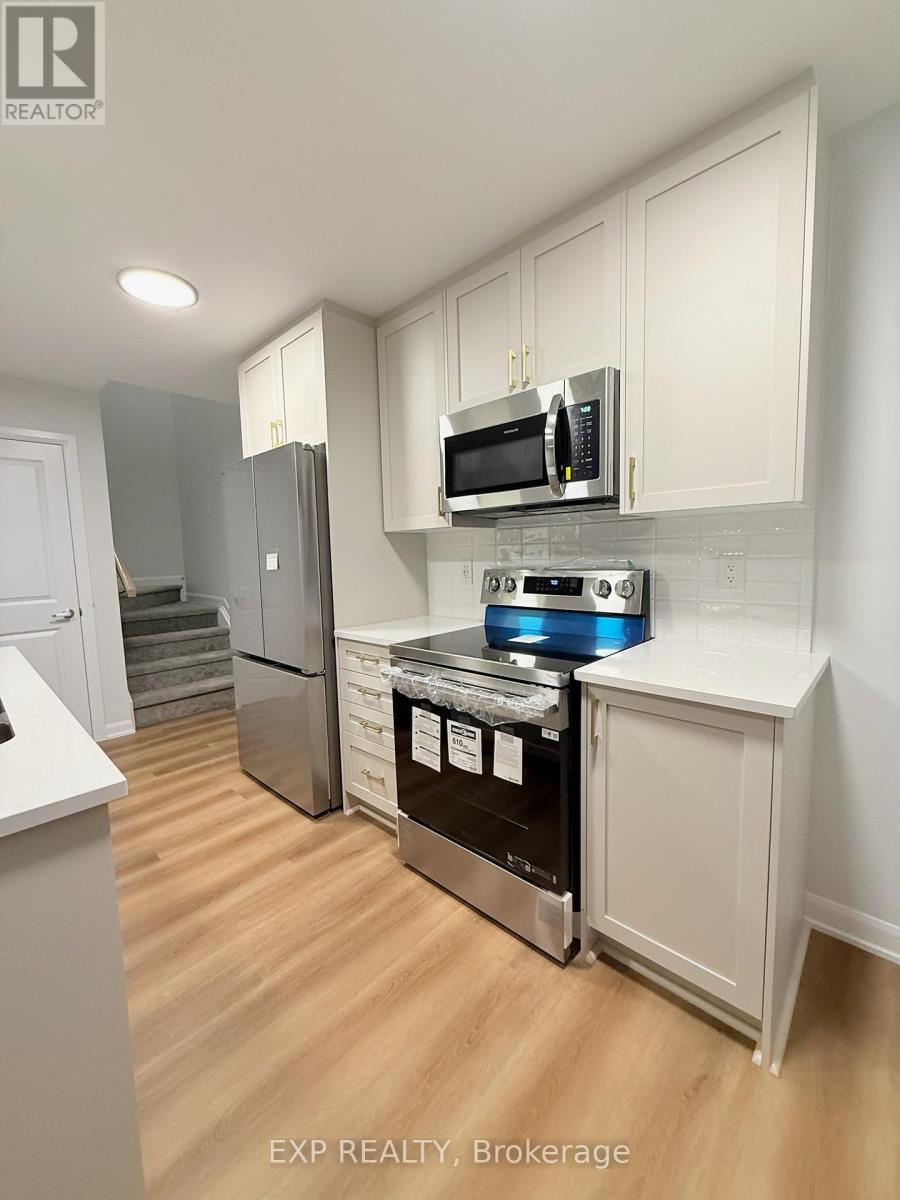 Unit # 2 - 101 Glenroy Gilbert Drive, Ottawa, Ontario  K2J 7N6 - Photo 3 - X12467170