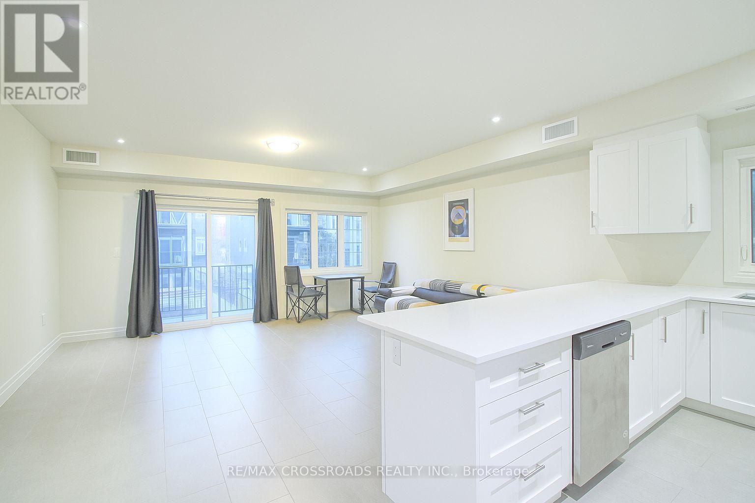 404 - 233 Watson Avenue, Windsor, Ontario  N8S 3R8 - Photo 2 - X12543854