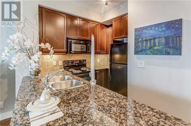 907 - 80 Absolute Avenue, Mississauga, Ontario L4Z 0A5 - Photo 6 - W12543922