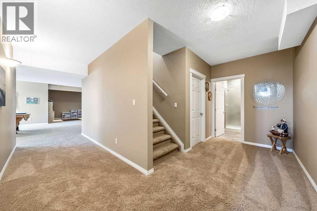 51 Norris Coulee Trail, De Winton, Alberta  T1S 5A5 - Photo 33 - A2267806