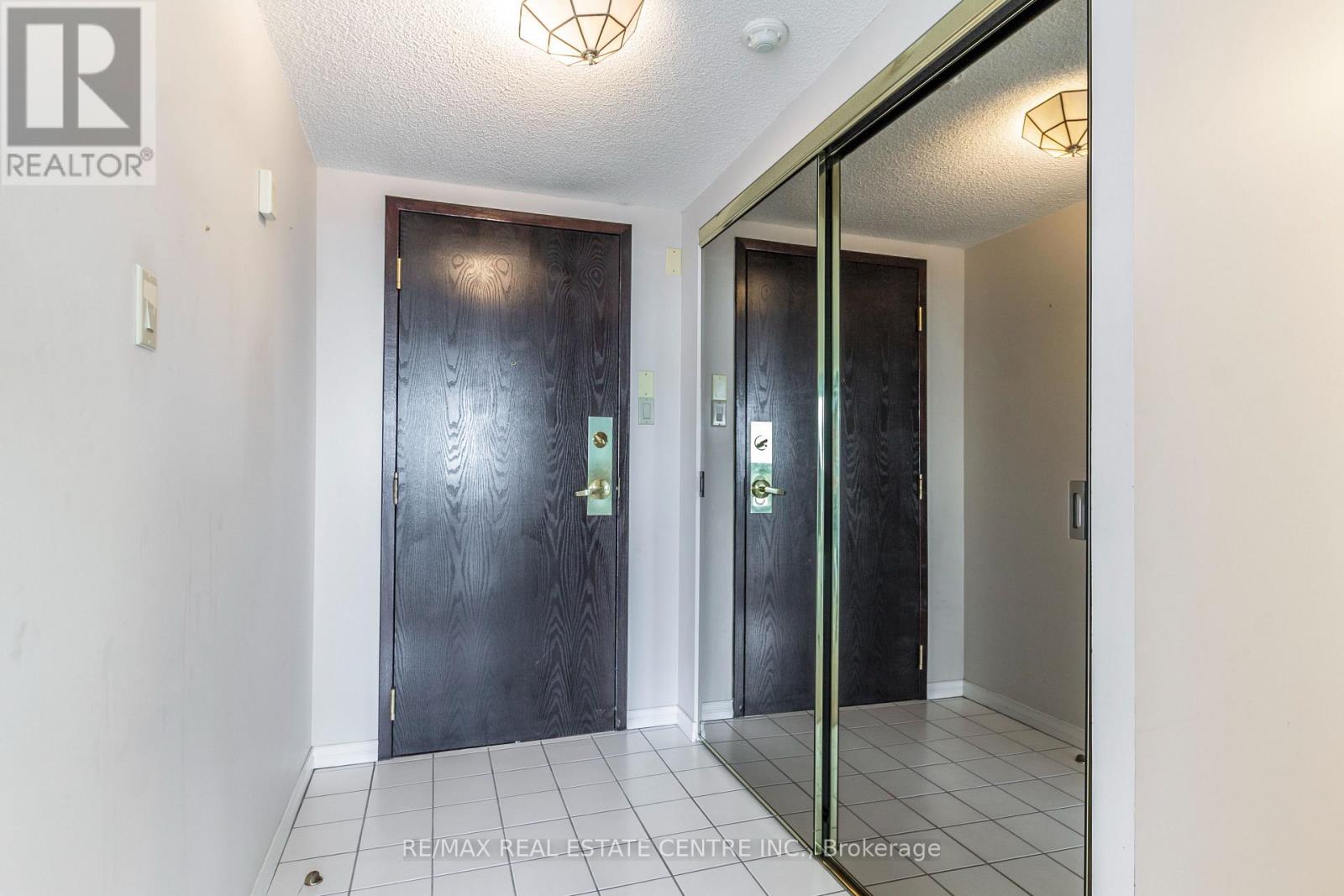 1109 - 100 Millside Drive, Milton, Ontario  L9T 5E2 - Photo 5 - W12544074