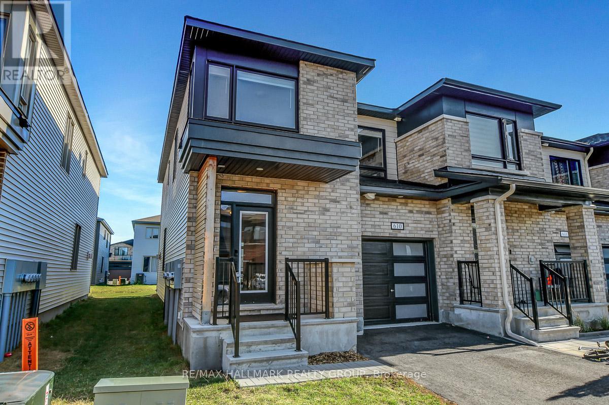 Welcome to this stunning End-Unit Townhome, newly built in 2024, in Barrhavens prestigious Stonebridge community home to the renowned Stonebridge Golf Course and celebrated for its family-friendly charm. Offering 3 spacious bedrooms and 3.5 bathrooms, this modern residence blends comfort, convenience, and style.Flooded with natural light, the open-concept main floor showcases oversized windows dressed with stylish, custom coverings, creating a warm and polished atmosphere throughout. The inviting living and dining spaces flow seamlessly into a chef-inspired kitchen, featuring sleek stainless steel appliances, abundant counter space, and contemporary finishes ideal for both everyday meals and entertaining.Upstairs, the primary suite offers a true retreat, complete with a spa-inspired ensuite featuring a glass-enclosed shower and a luxurious freestanding soaker tub perfect for unwinding at the end of the day. The convenience of second-floor laundry and two additional versatile bedrooms add to the thoughtful design.The fully finished basement extends the living space with a bright recreation room and a full bathroom, ideal for guests or family movie nights. A deep driveway provides extra parking, while the end-unit setting offers privacy and additional natural light.Located minutes from schools, parks, and transit, this home captures the very best of Stonebridge living. (id:48254)