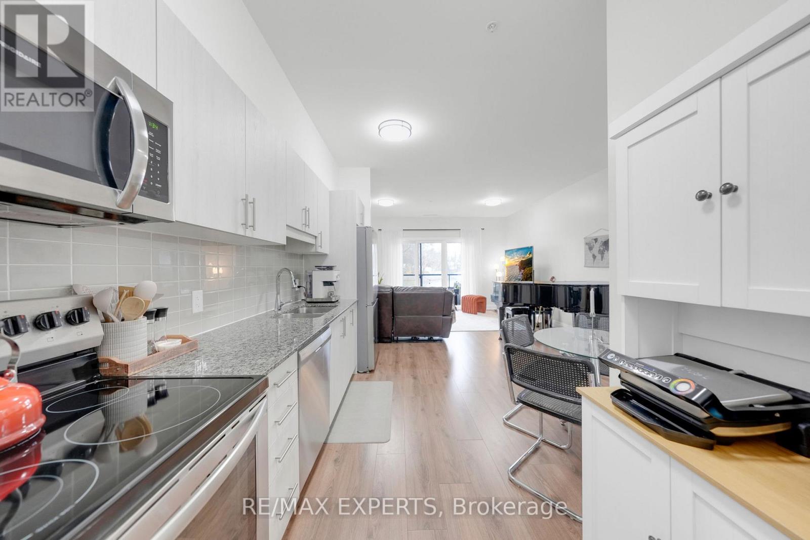 205 - 64 Queen Street S, New Tecumseth, Ontario L0G 1W0 - Photo 9 - N12544440