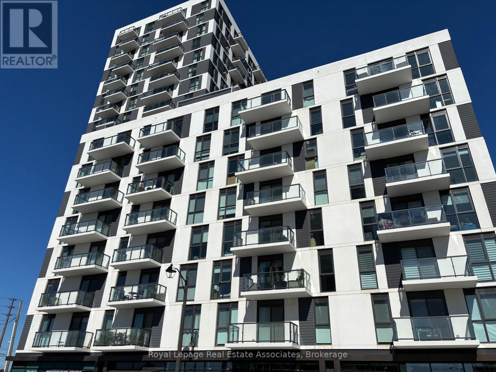 406 - 335 Wheat Boom Drive, Oakville, Ontario  L6H 7Y1 - Photo 3 - W12544358